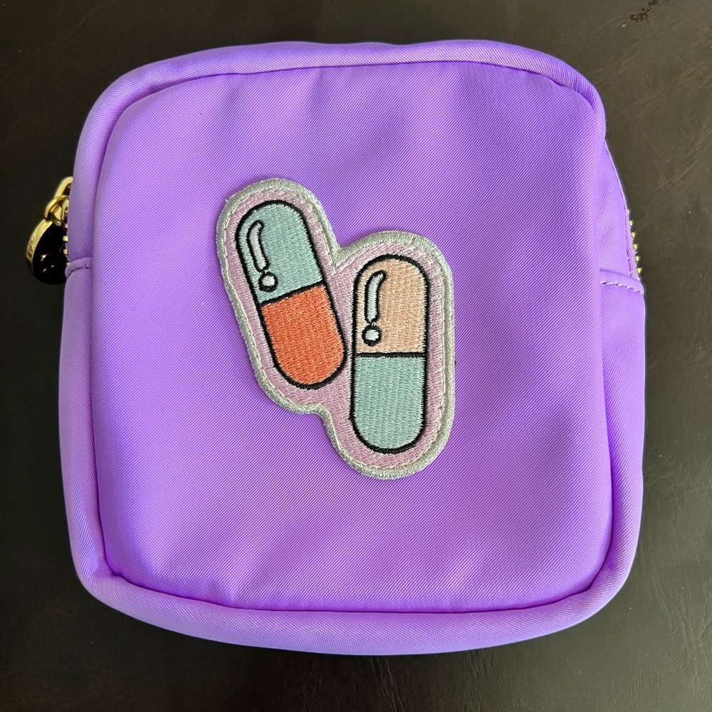 Stoney clover lane mini açaí pouch with sewn on pill patch